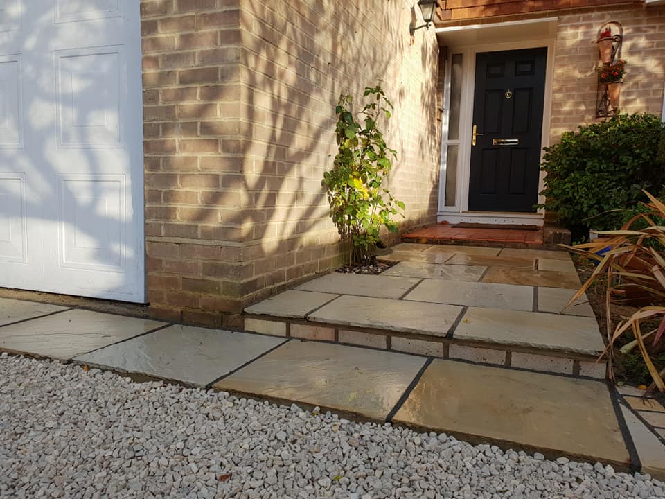 Driveway and front door patio and gravel