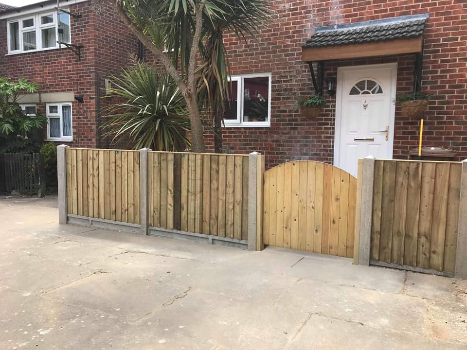 Fence, gate, patio and pebble/shingle front garden landscaping